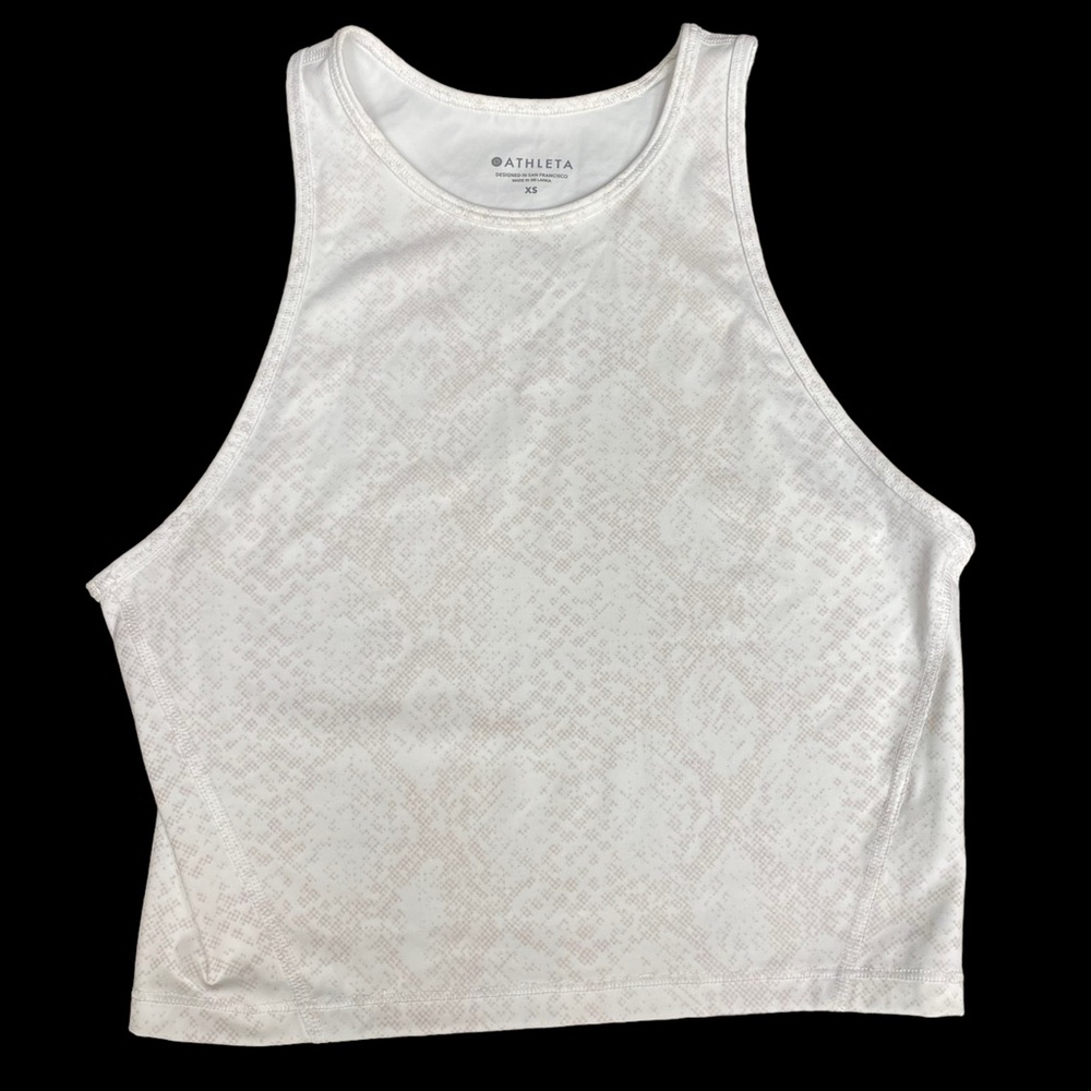 Athleta xs cropped workout top. White with beige detail. Never worn. Racerback.